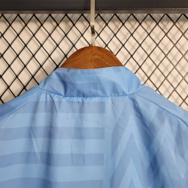 23 - 24 Windbreaker Uruguay Home Retro | Footballshirt.online - Footballshirt.online